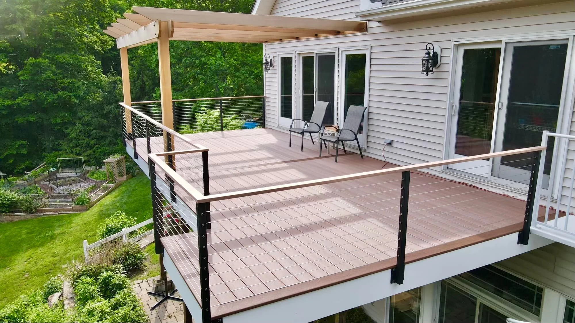 Elevated deck and pergola in daylight