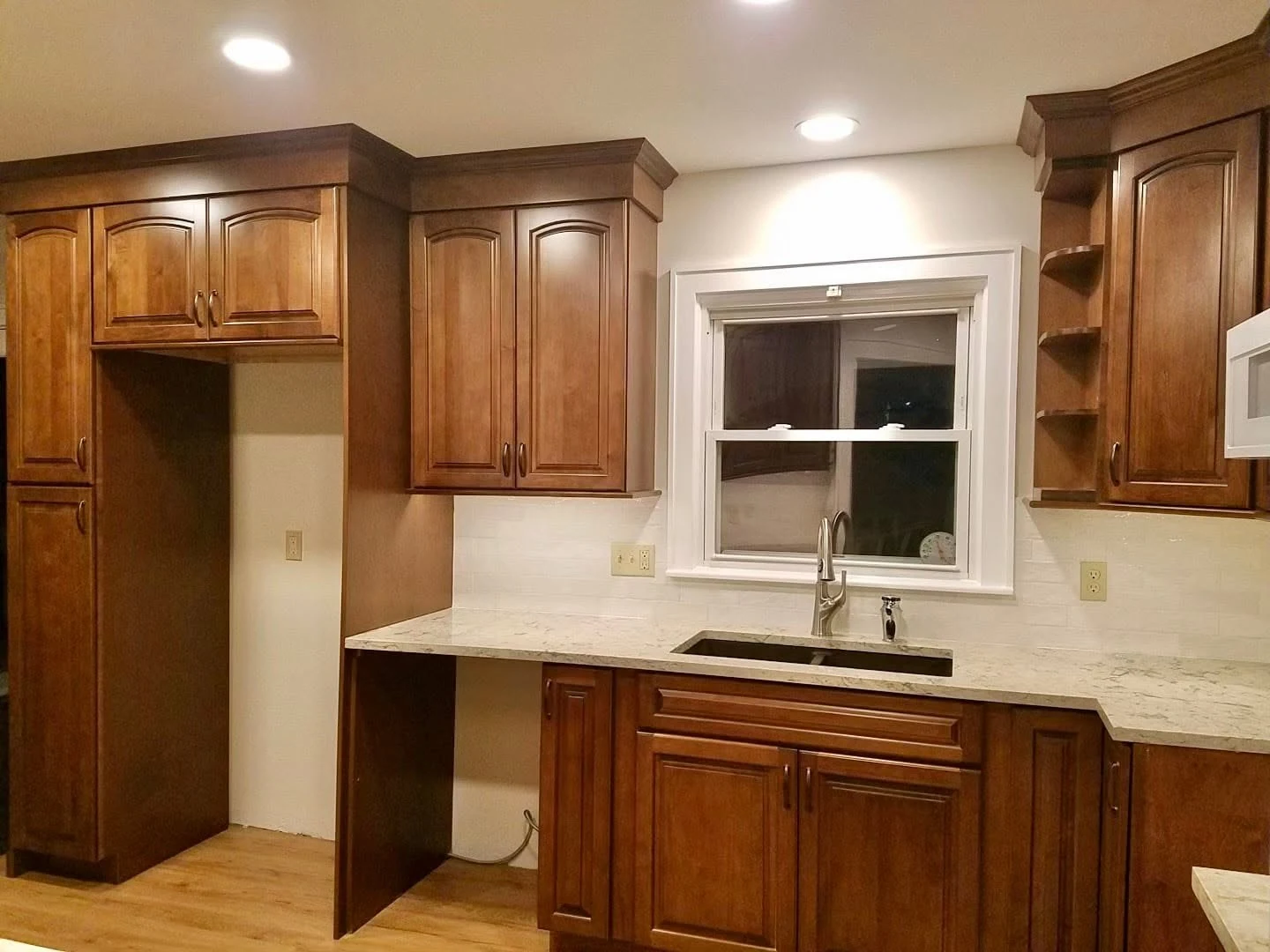 Warm wood kitchen with a light countertop